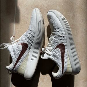 Nike White and Rose Gold Sneakers